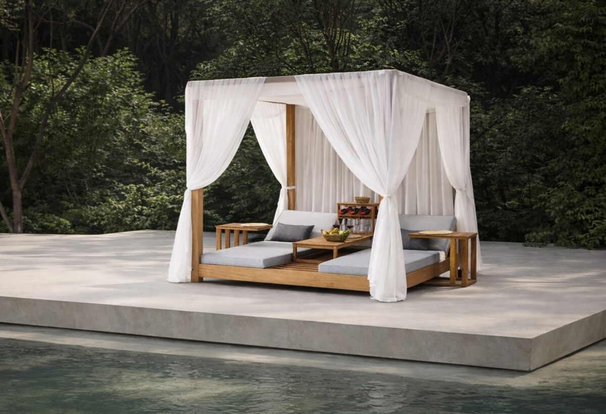 Resort style outdoor lounge with white cabana daybed and luxury patio furniture